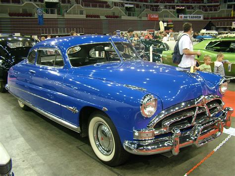The Hudson Hornet is a full-size car manufactured by Hudson Motor Car Company of Detroit, Michigan from 1951 until 1954, when Nash-Kelvinator and Hudson merged to form American Motors Corporation (AMC). Hudson automobiles continued to be marketed under the Hudson brand name through the 1957 model year. 